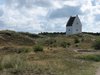 DEN TILSANDEDE KIRKE 