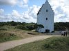 DEN TILSANDEDE KIRKE 