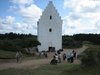 DEN TILSANDEDE KIRKE 