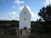 DEN TILSANDEDE KIRKE 